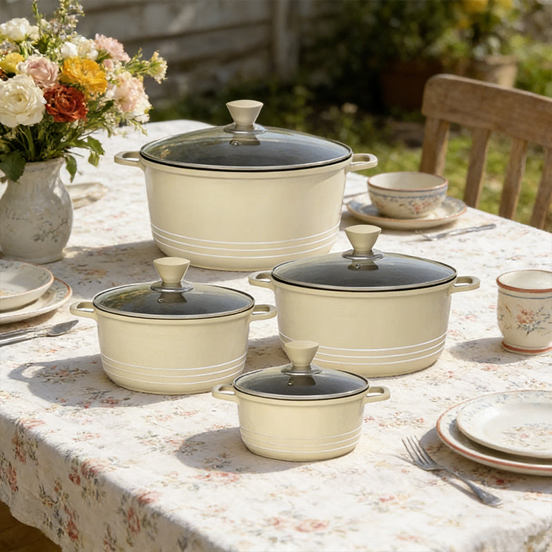 Lavish Kitchen Isle non-stick die-cast stockpot set with 4 cream-colored cooking pots, durable and easy to clean.