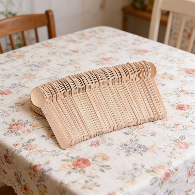 Set of 100 disposable wooden spoons from Lavish Kitchen Isle, eco-friendly, natural, recyclable, 15.5cm for quick use.