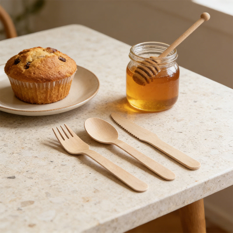 Set of 100 disposable wooden cutlery pieces including spoons, forks, and knives from Lavish Kitchen Isle, 15.5cm long