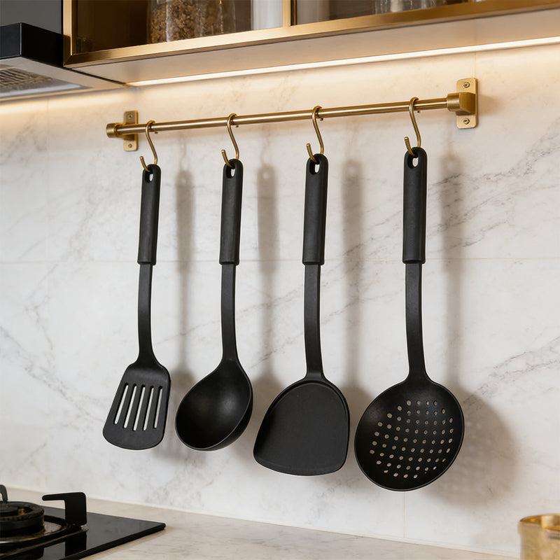 Set of six black heat-resistant plastic cooking utensils from Lavish Kitchen Isle, including spatulas and spoons for versatile kitchen use.