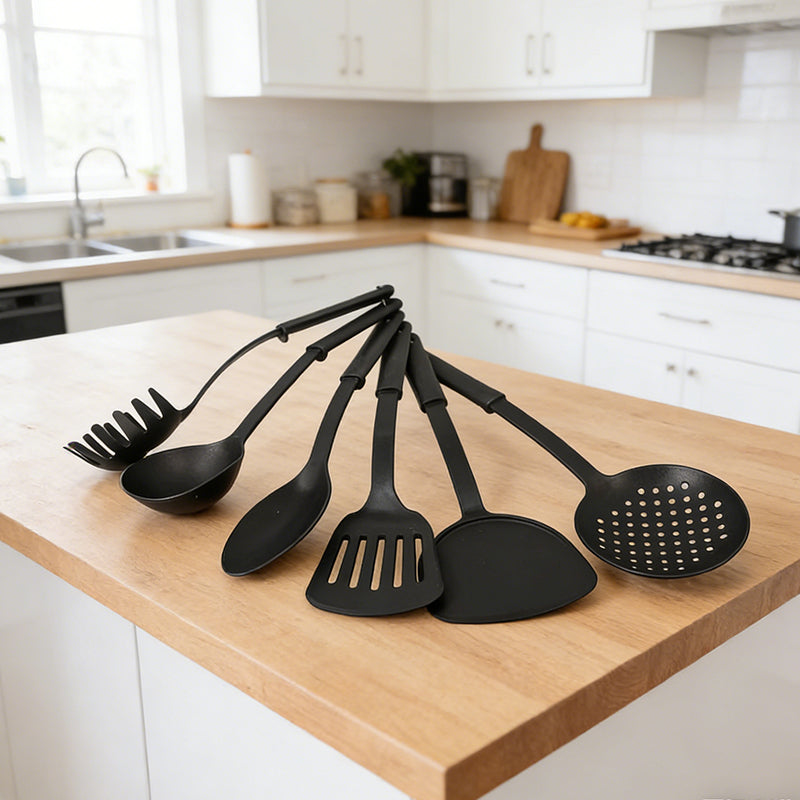Set of 6 black heat-resistant plastic cooking utensils from Lavish Kitchen Isle, including spatulas and spoons for versatile kitchen use.