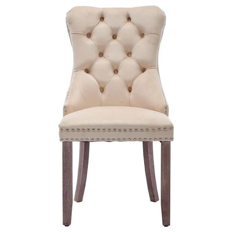 Set of 4 grey and beige velvet wingback dining chairs with button tufted backrests and solid wood legs by Lavish Kitchen Isle