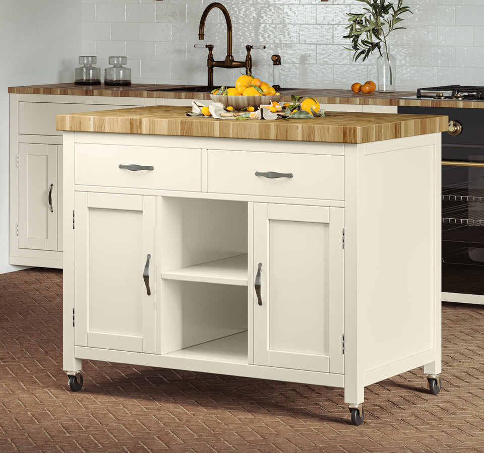 Cream kitchen island with butcher's block top by Baumhaus, featuring a spacious design and elegant finish.