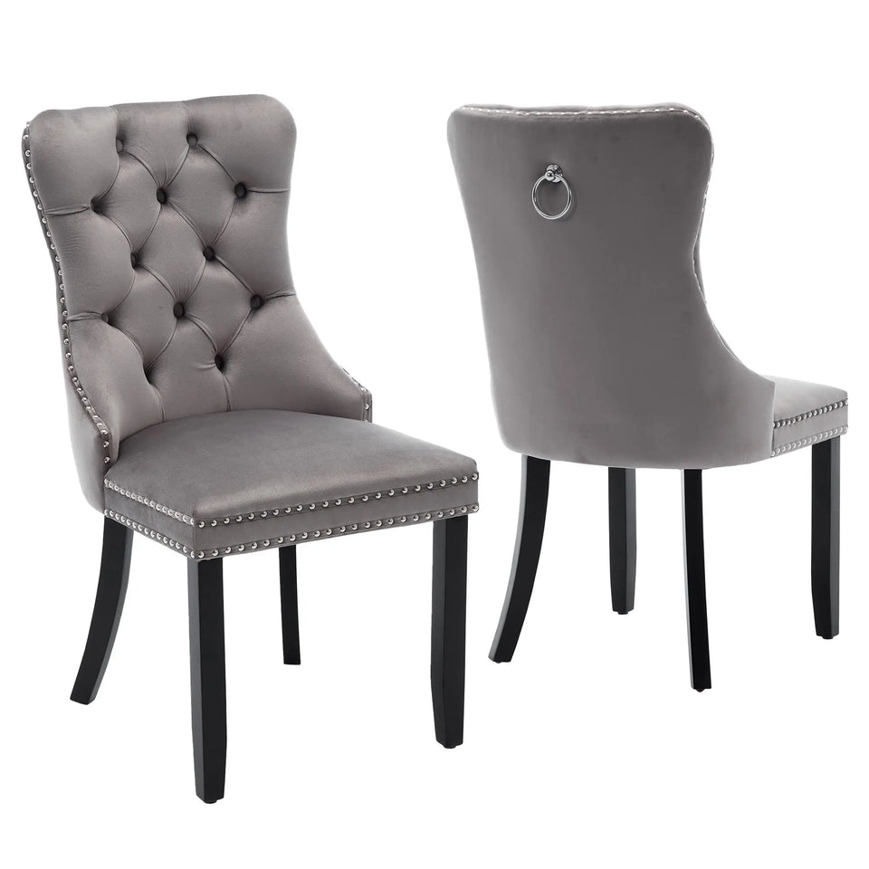 Set of 2 grey and beige velvet dining chairs with button tufted backrests and knocker ring details, by Lavish Kitchen Isle.