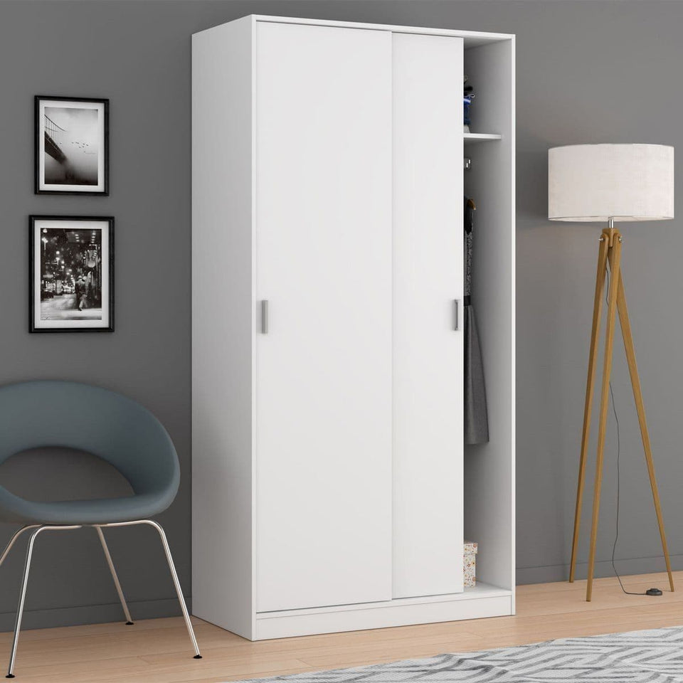 White sliding door wardrobe with two doors, hanging rail, and shelf for narrow bedroom storage by Lavish Kitchen Isle.