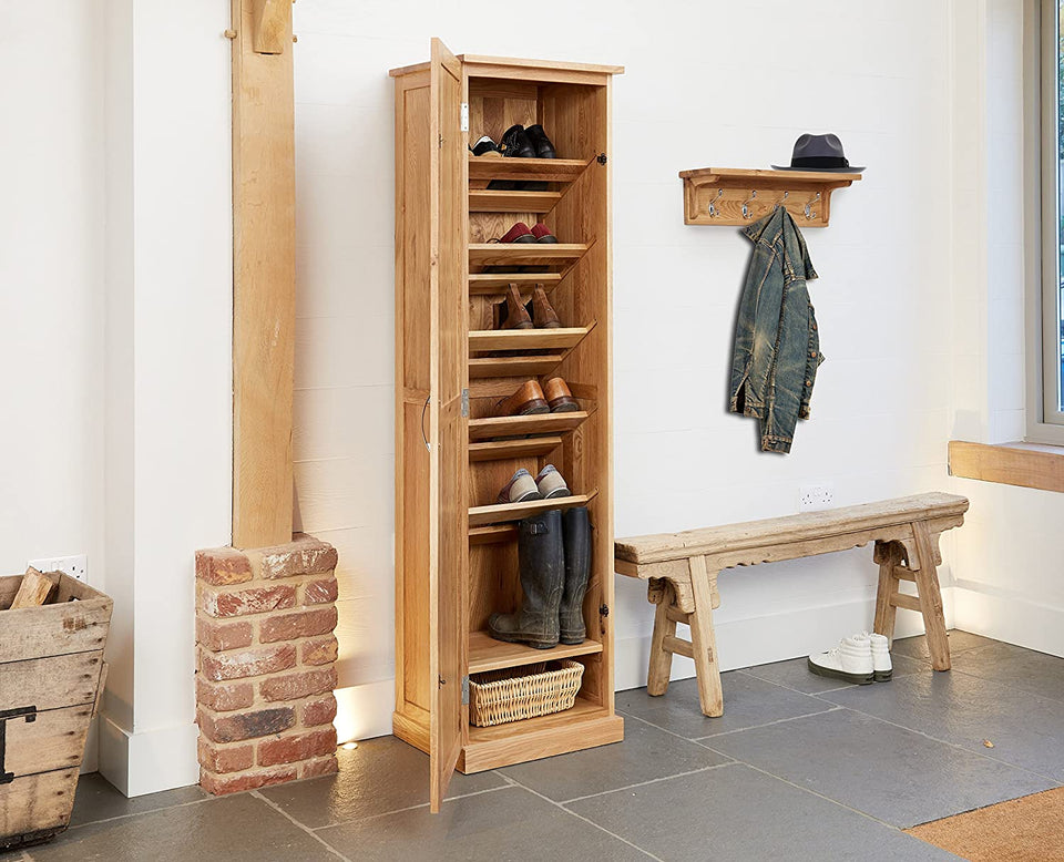 Baumhaus Mobel Oak tall shoe cupboard with multiple doors and shelves for organized footwear storage in a modern oak finish