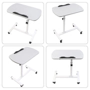 Grey adjustable overbed table tray with wheels, ideal for home or medical use, featuring a spacious surface and sturdy design.