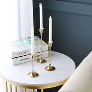 Set of 3 Lavish Kitchen Isle candlestick holders for decorative use on a fireplace or dining table.