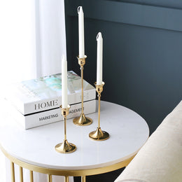 Set of 3 Lavish Kitchen Isle candlestick holders for decorative use on a fireplace or dining table.