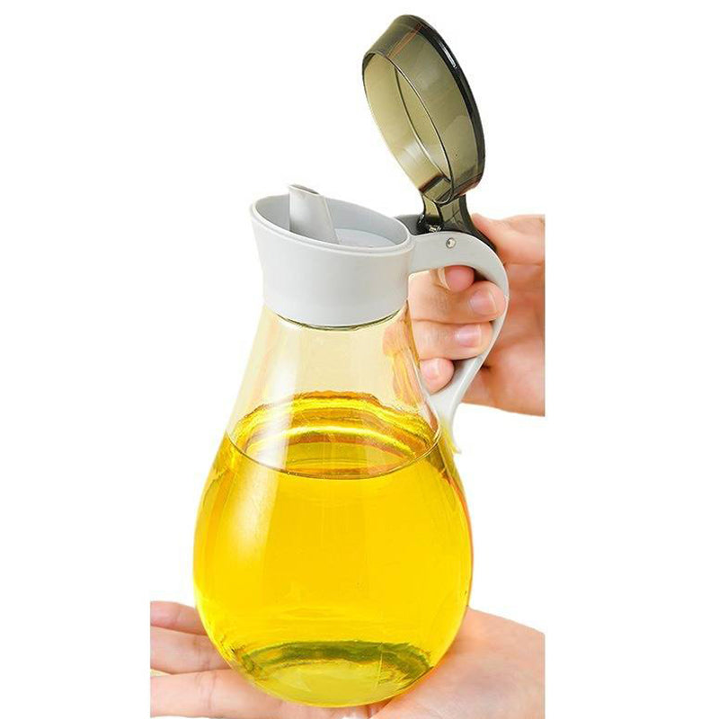 Lavish Kitchen Isle 380ml glass sauce dispenser with plastic top for oil, syrup, and condiments on a kitchen countertop