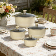 Lavish Kitchen Isle non-stick die-cast stockpot set with 4 cream-colored cooking pots, durable and easy to clean.