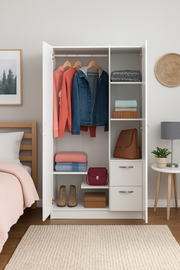 Modern white 3-door wardrobe with hanging rail, shelves, and drawers, providing spacious bedroom storage by Lavish Kitchen Isle.