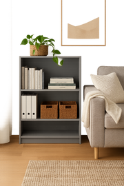 Dark grey Lavish Kitchen Isle bookcase with three adjustable shelves, shown in a modern room setting for versatile storage.