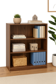 Lavish Kitchen Isle low wide walnut bookcase with three adjustable shelves, modern storage unit in a living room setting.