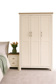 Lavish Kitchen Isle Ite 3-piece bedroom set with cream and oak effect wardrobe, chest of drawers, and bedside table, display image.