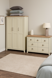 Lavish Kitchen Isle Ite 2-piece bedroom set with cream and oak effect, includes a 3-door wardrobe and a combination chest of drawers.