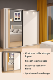 Large mirrored sliding door wardrobe with cashmere and artisan oak effect finish, modern design, and sleek reflective surface.