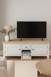 Baumhaus Signature Widescreen Television Stand with sleek design and functional shelves in a modern living room setting.