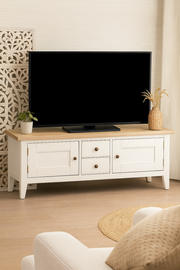 Baumhaus Signature Widescreen Television Stand showcasing a sleek design with ample storage for media devices.