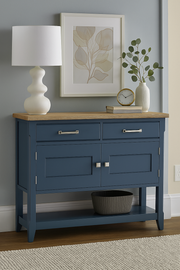 Baumhaus blue small sideboard in a modern living room setting, showcasing its sleek design and functional storage.