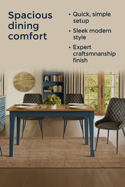 Modern blue dining table by Baumhaus with sleek wooden surface and sturdy legs, set in a contemporary dining room.