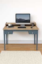 Baumhaus signature blue desk in a stylish setting, showcasing its modern design and practical dressing table features.