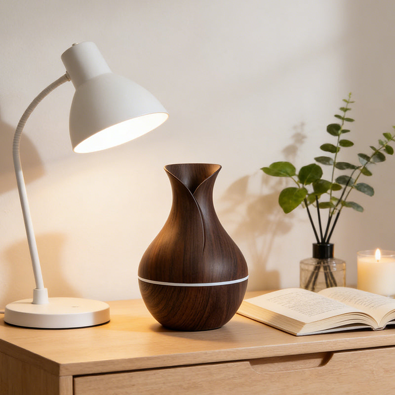 Lavish Kitchen Isle compact 200ml mist diffuser with lavender oil, emitting soft light for aromatherapy and humidification.