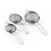 Set of three stainless steel kitchen strainers with fine mesh, ideal for sieving and straining food in a modern Lavish Kitchen Isle set.