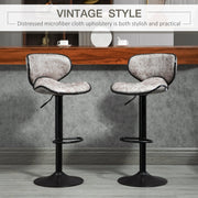 Set of 2 Lavish Kitchen Isle adjustable PU leather bar stools with swivel seats, armless design, footrests, for home, kitchen, or café.