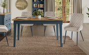 Baumhaus Signature Blue Dining Table with sleek wooden finish, shown in a modern dining room setting.