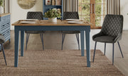 Baumhaus Signature Blue Dining Table with sleek wooden finish, rectangular surface, and modern design ideal for contemporary dining rooms.
