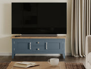 Baumhaus Signature Blue Widescreen Television Stand with modern design and spacious storage compartments.