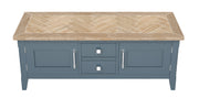 Baumhaus Signature Blue Widescreen Television Stand with spacious shelves and modern design in a stylish living room setting.