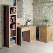 Tall narrow solid oak bookcase by Baumhaus featuring contemporary design with multiple shelves for stylish storage.