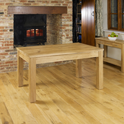 Baumhaus Mobel Oak Dining Table 120cm with solid oak and slate finish, seats four, natural wood grain and sturdy design.