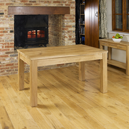 Baumhaus Mobel Oak Dining Table 120cm with solid oak and slate finish, seats four, natural wood grain and sturdy design.