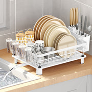 Stainless steel dish drying rack with drip tray and utensil holder, white, designed for efficient kitchen dish drying.