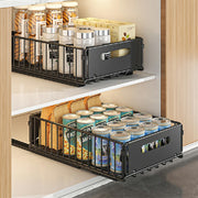 Two black carbon steel storage drawers with smooth sliding mechanisms, designed as cabinet organizers by Lavish Kitchen Isle.