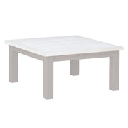 Baumhaus Greystone low square coffee table with a sleek wooden finish, modern design, and sturdy square legs in a living room setting.