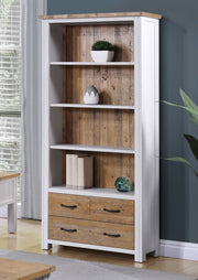 Large white open bookcase with drawers by Baumhaus, showcasing spacious shelves and a clean design.