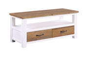 Baumhaus white widescreen television cabinet with open shelves and sleek design in a modern living room setting.