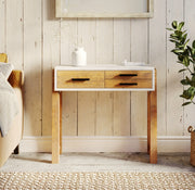 Reclaimed small console table by Baumhaus, showcasing a rustic wood finish and minimalist design in a cozy setting.