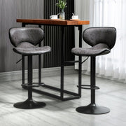 Set of 2 Lavish Kitchen Isle adjustable PU leather bar stools with swivel seats, footrests, and armless design for home or café use.