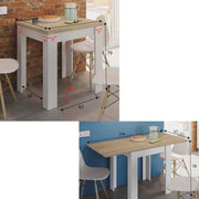 Lavish Kitchen Isle Ridge white and light oak effect extending dining table in a modern kitchen setting with chairs.