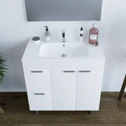 Lavish Kitchen Isle Serenade white gloss bathroom vanity cabinet with two doors, drawers, sink, and mirror for modern bathroom decor.