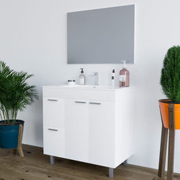 Lavish Kitchen Isle Serenade white gloss bathroom vanity with two doors, two drawers, sink, and mirror for modern bathroom decor.