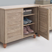 Lavish Kitchen Isle 2-door Sonoma Oak shoe cabinet with storage for up to 10 pairs of shoes, featuring a sleek wood finish.