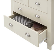 Cream bedroom furniture chest of drawers with four storage drawers, by Lavish Kitchen Isle, in a modern bedroom setting.
