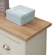 Lavish Kitchen Isle cream 4-drawer chest of drawers for bedroom storage, showcasing its sleek design and ample space.