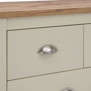 Cream bedroom chest of 7 drawers with oak effect top and steel handles, from Lavish Kitchen Isle.